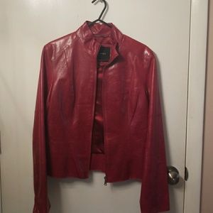 Red leather, no rip, cracks, tares